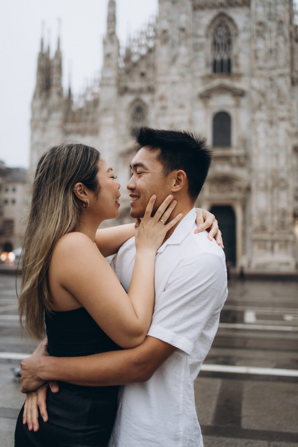 There is such warmth in a couple wrapped in each other's arms, sharing a private smile while the majestic Duomo blurs into a dreamy backdrop behind them. I photograph couples across Milan and on Lake Como, and travel throughout Italy for private sessions. Looking to hire a couple photographer in Milan? This is the tender, close-up mood I love to create.
