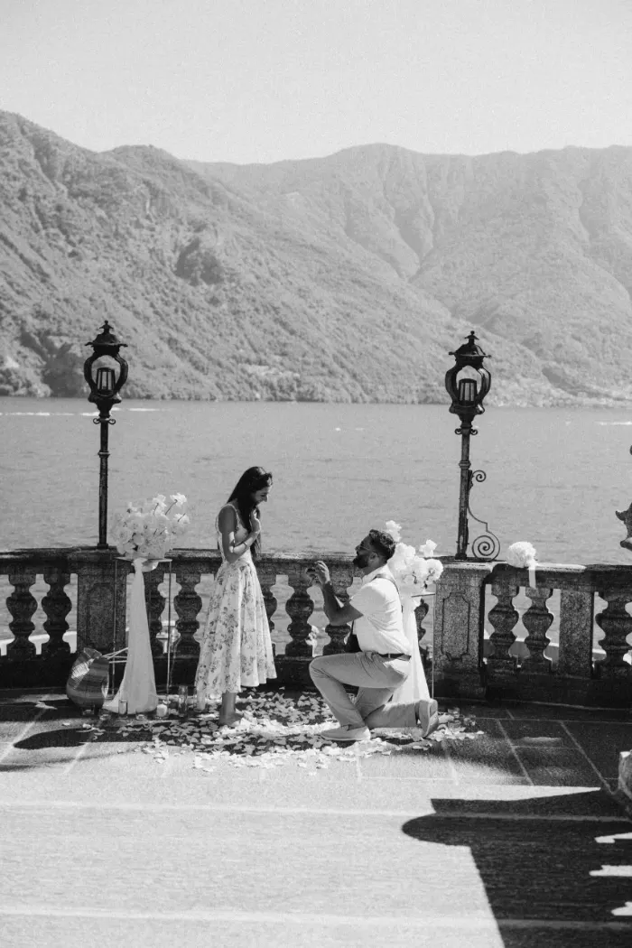 Black and white photo of a proposal on a Tremezzo terrace
