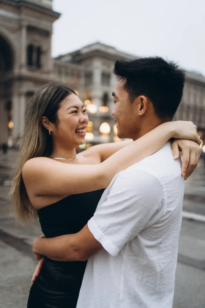 Couple hugging and laughing in Milan