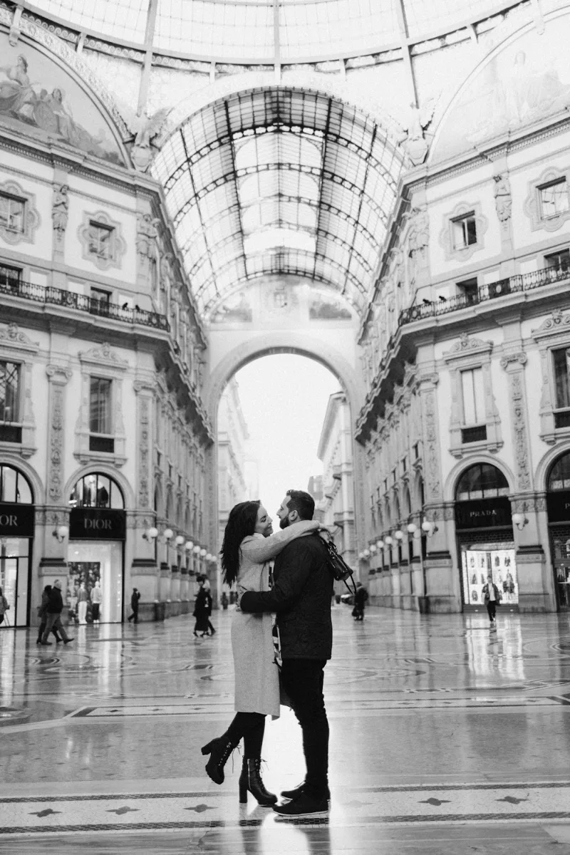 Black and white kiss in the empty Galleria Vittorio Emanuele II, Milan
