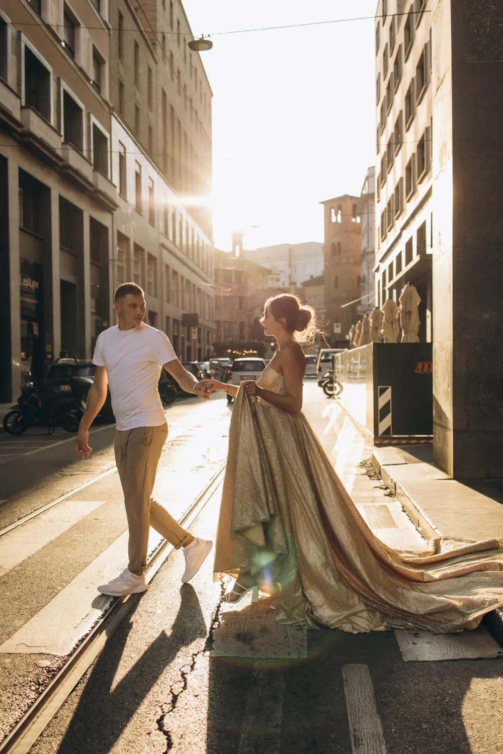 Couple on a Milan street in warm evening light