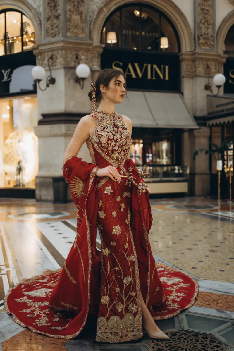 dress-rental-milan-red-gold-gown Woman in a red and gold gown in Galleria Vittorio Emanuele II, Milan