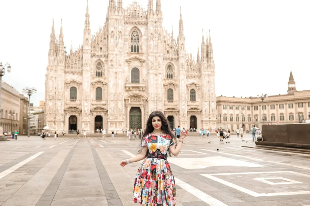 Woman in a floral dress in the empty Piazza del Duomo, Milan
