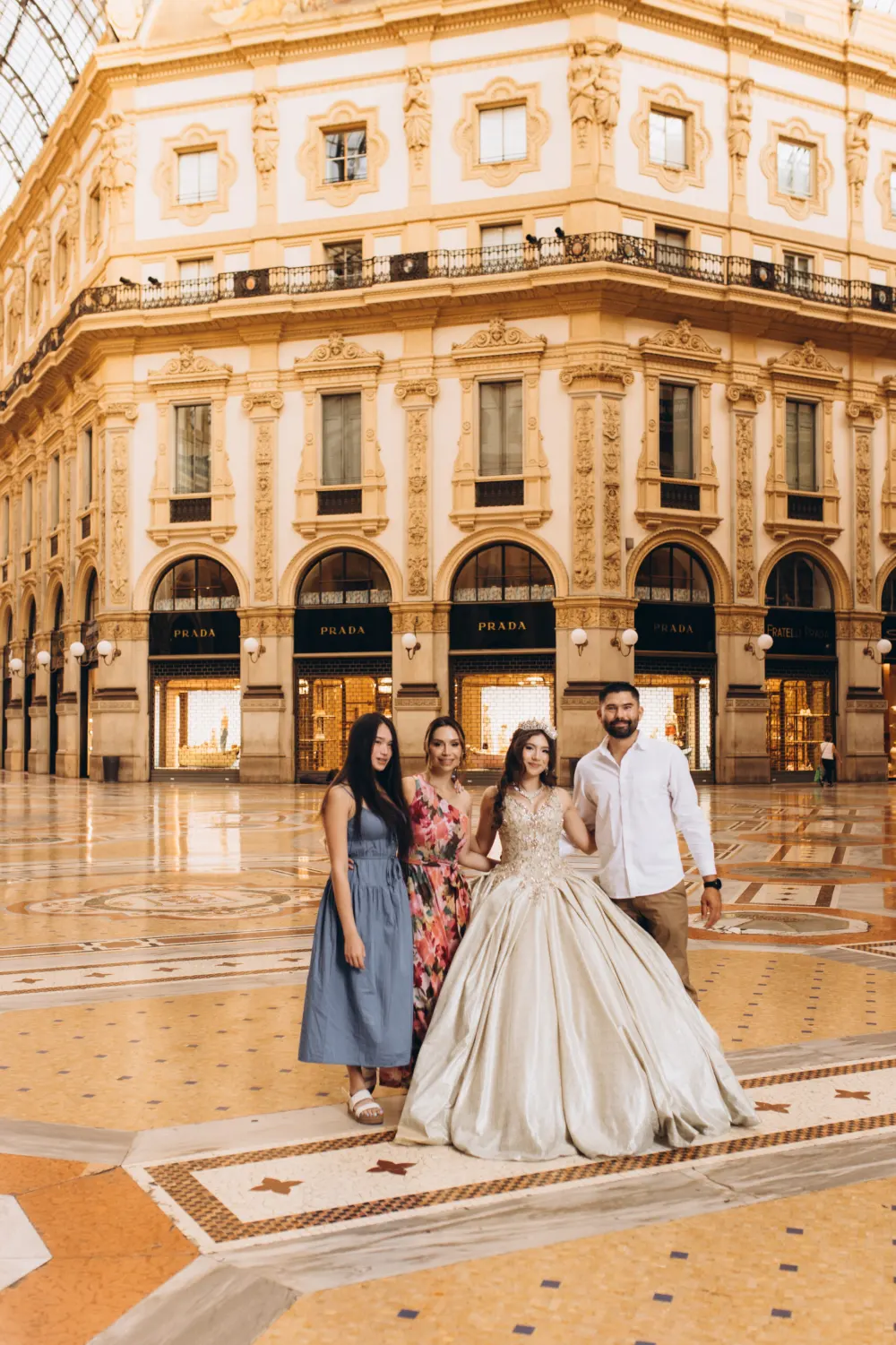 Quinceañera with her sister and parents in the Galleria Vittorio Emanuele II, Milan