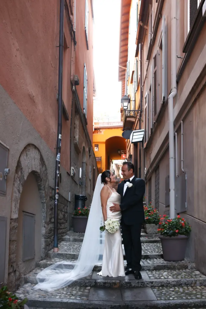 Bride and groom by the water in Bellagio, Lake Como