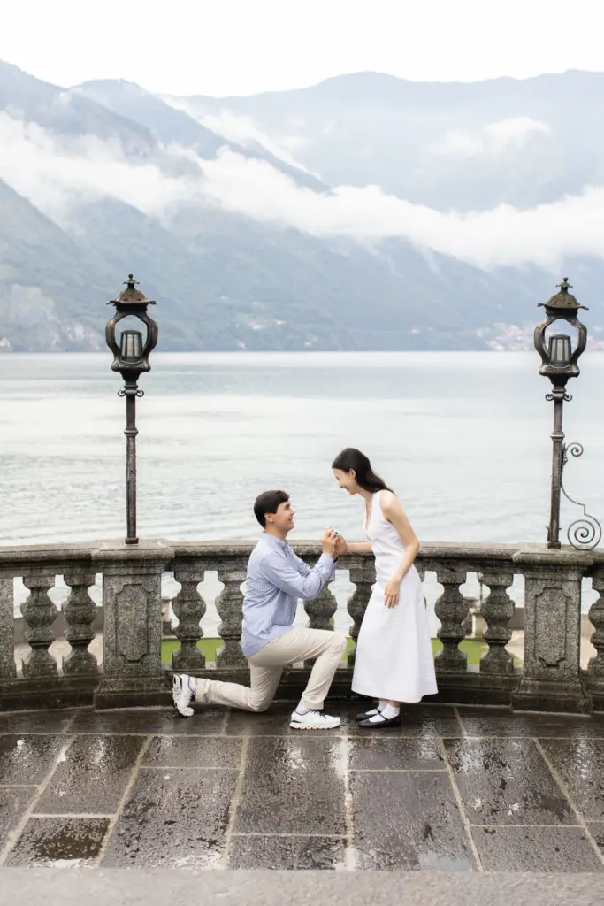 A proposal on the balustrade terrace of Villa Cipressi in Varenna, mountains over Lake Como behind